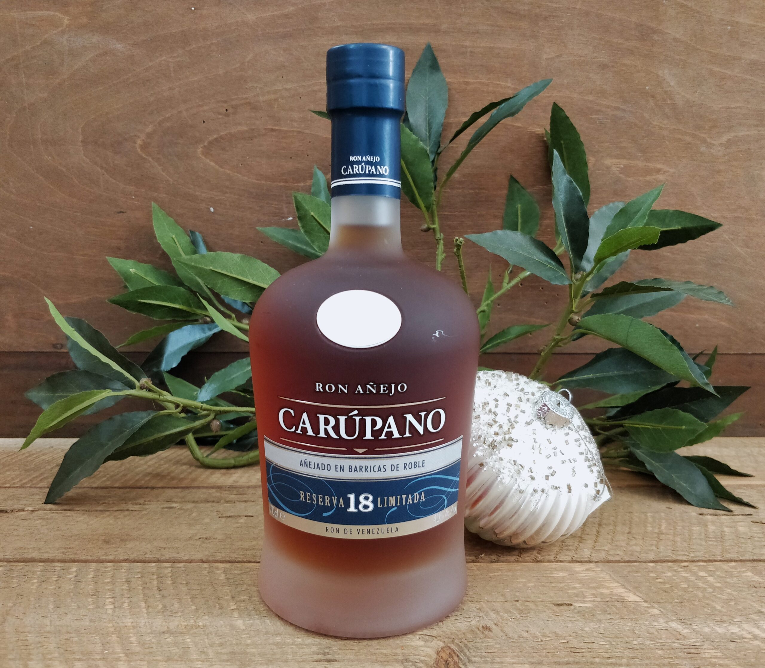 Carúpano 18 1 fl. Carupano Reserva 18 Limitada samt en nytårs cigar - Billede 1